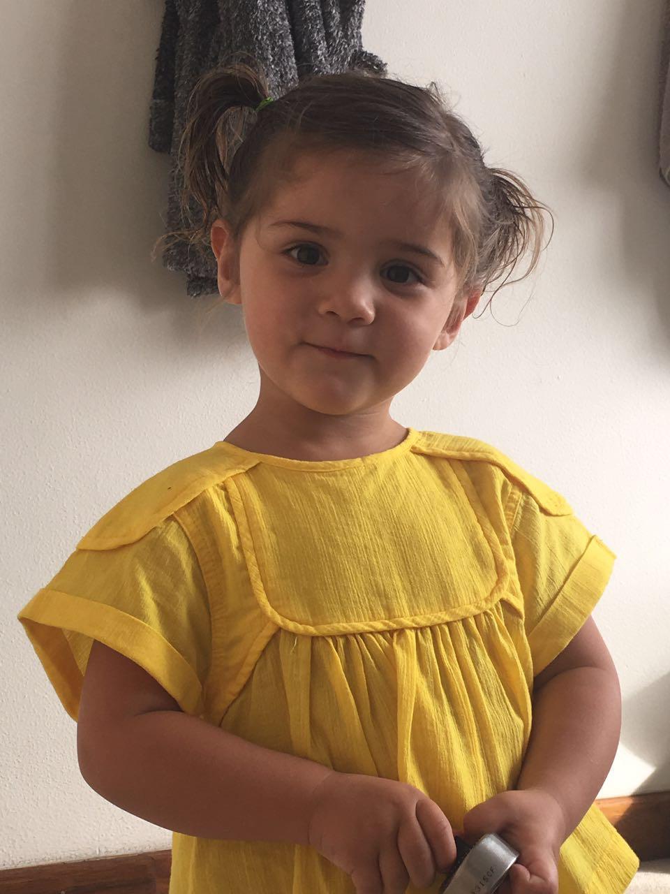 Mica in a sunny yellow dress