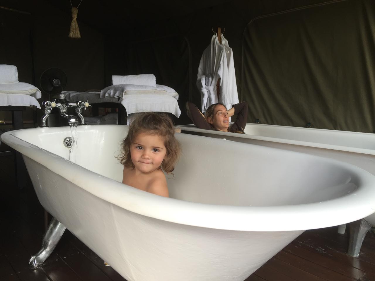 Mica in a vintage clawfoot tub